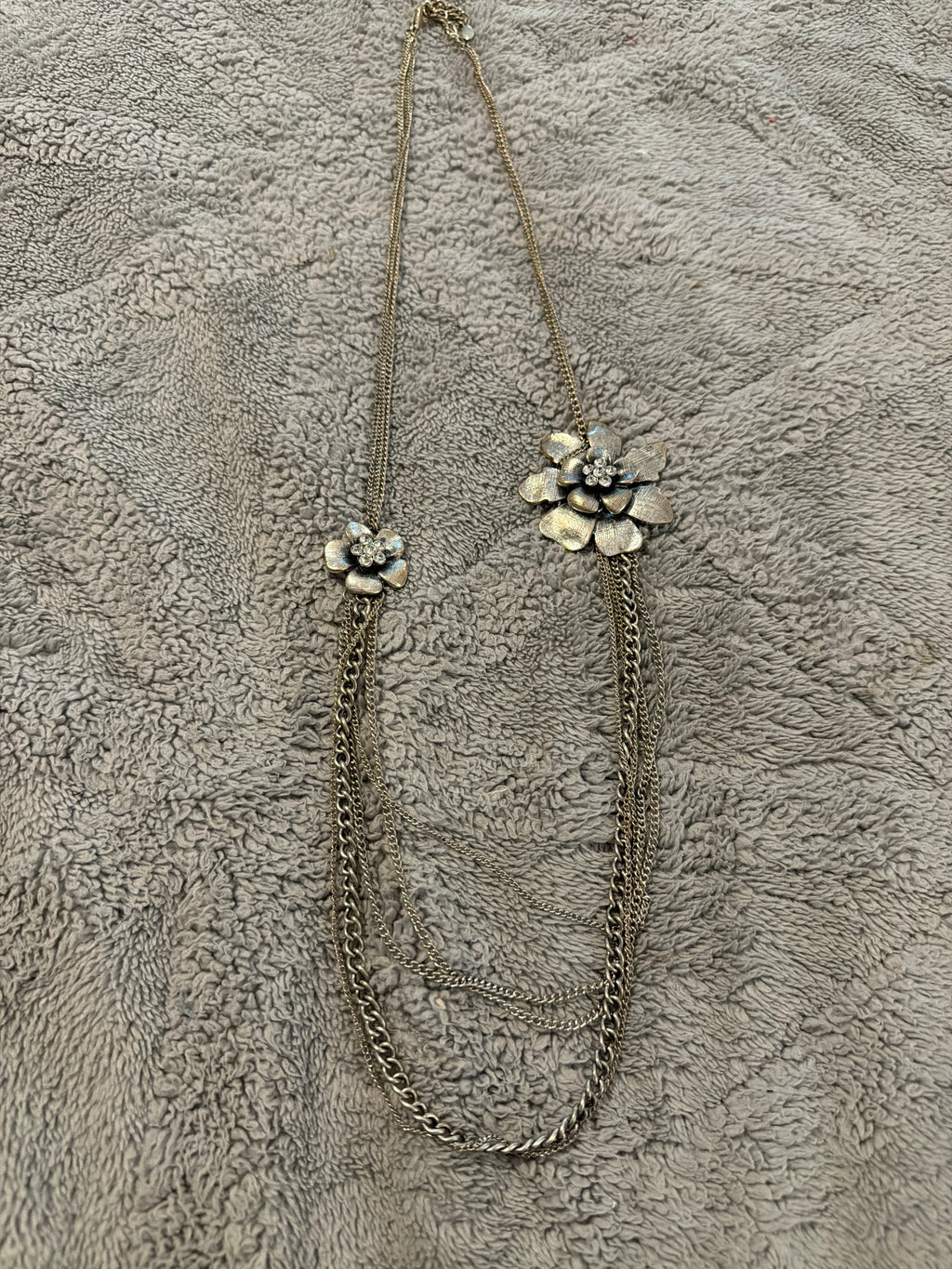 Silver Necklace with flower accents, 18” long. *some wear