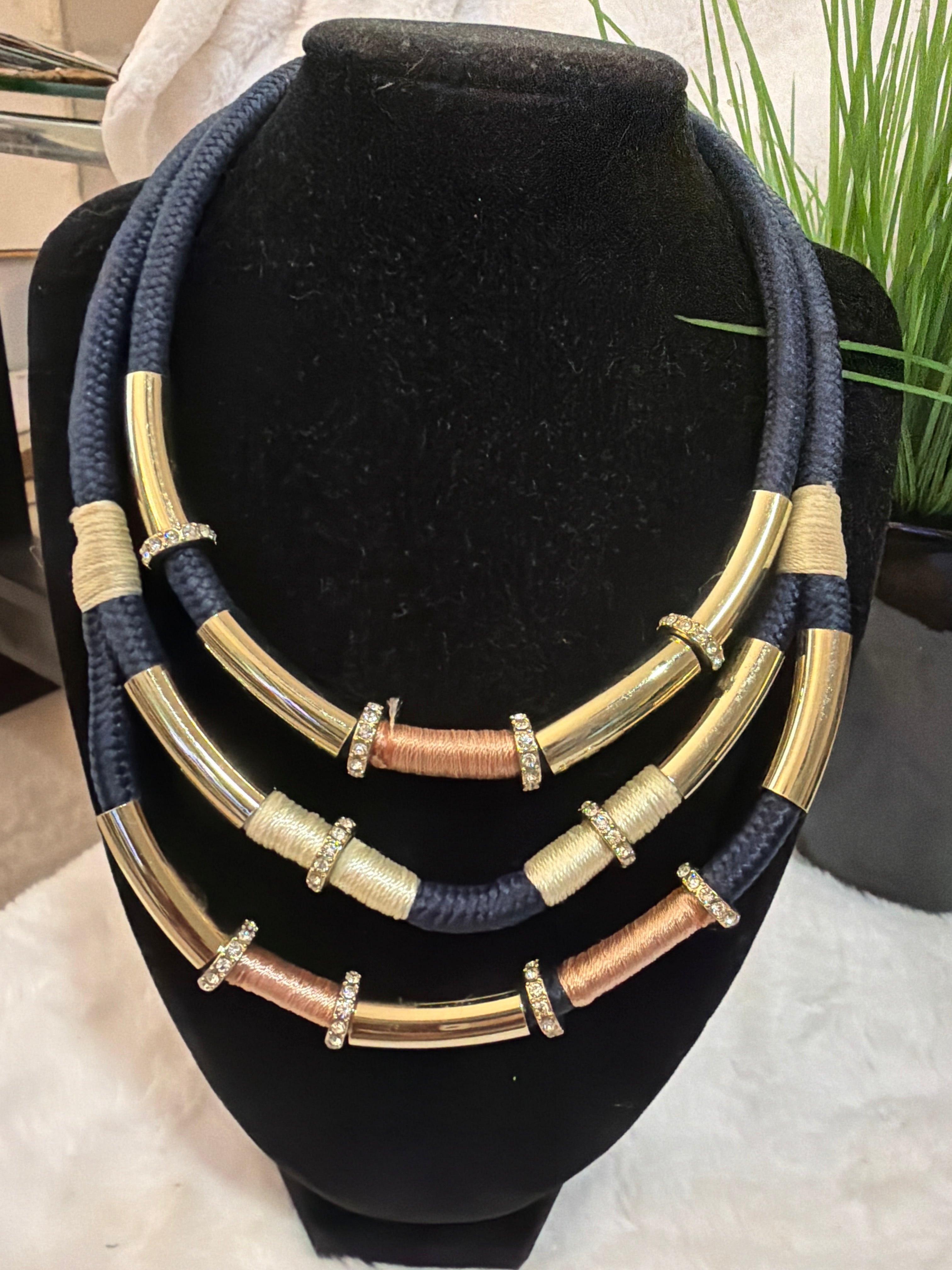 Blue and gold thread necklace, $5.00