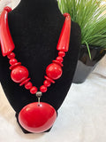 Red, heavy plastic necklace, $10.00