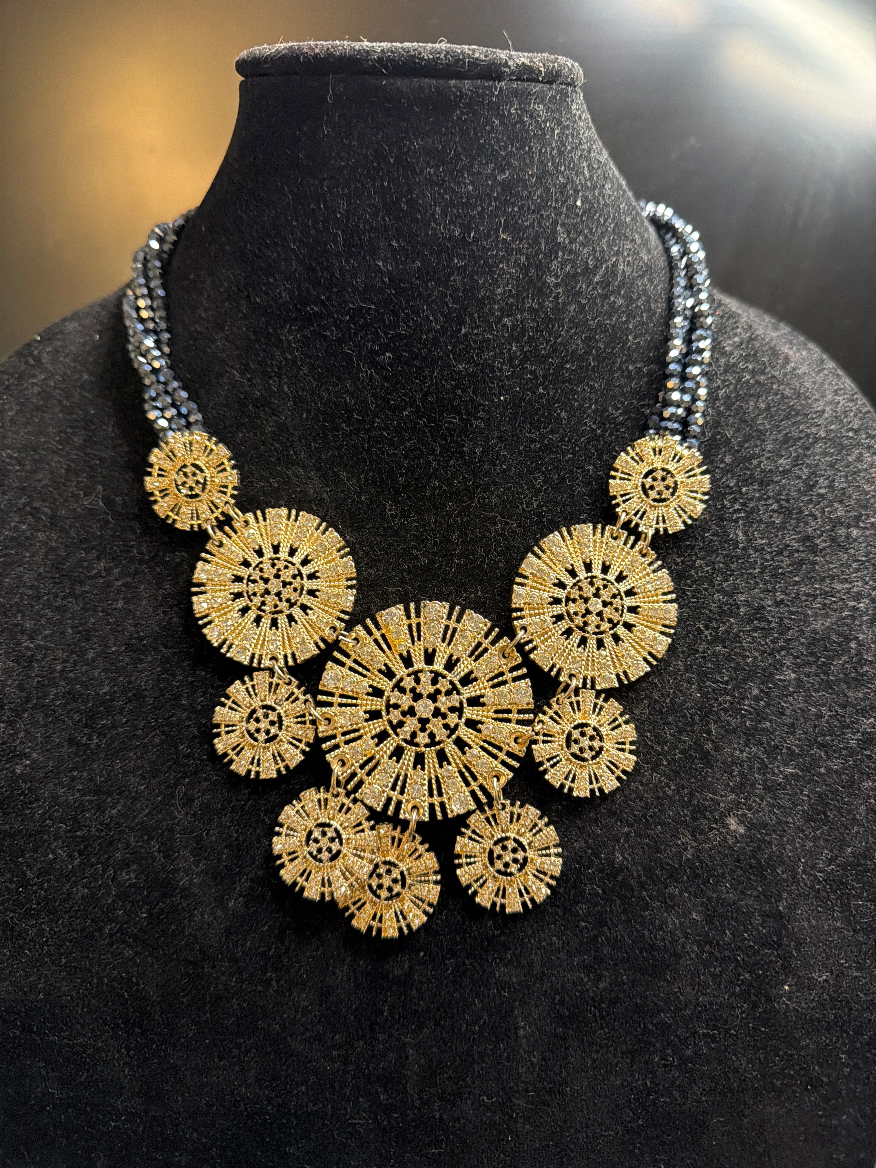 Gold Starburst with Grey Rhinestones
