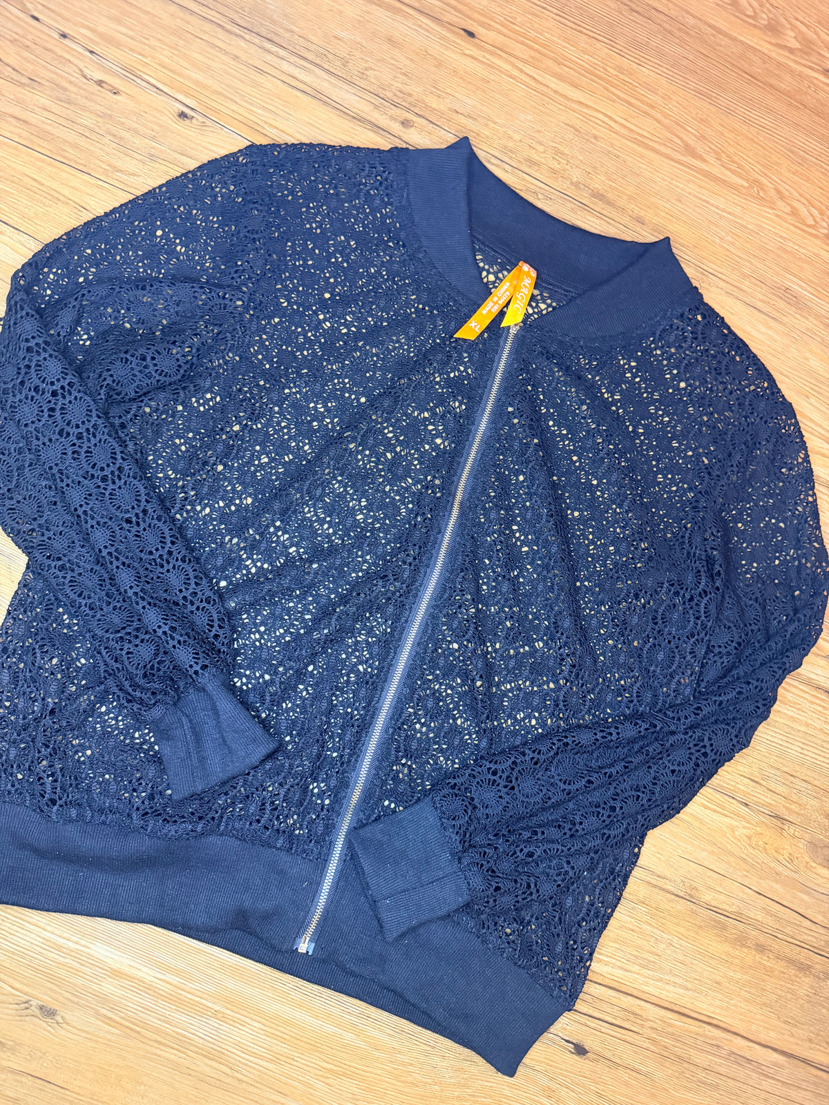 Magic Black Eyelet Jacket. Zip front. Size XL. Feels like M/L