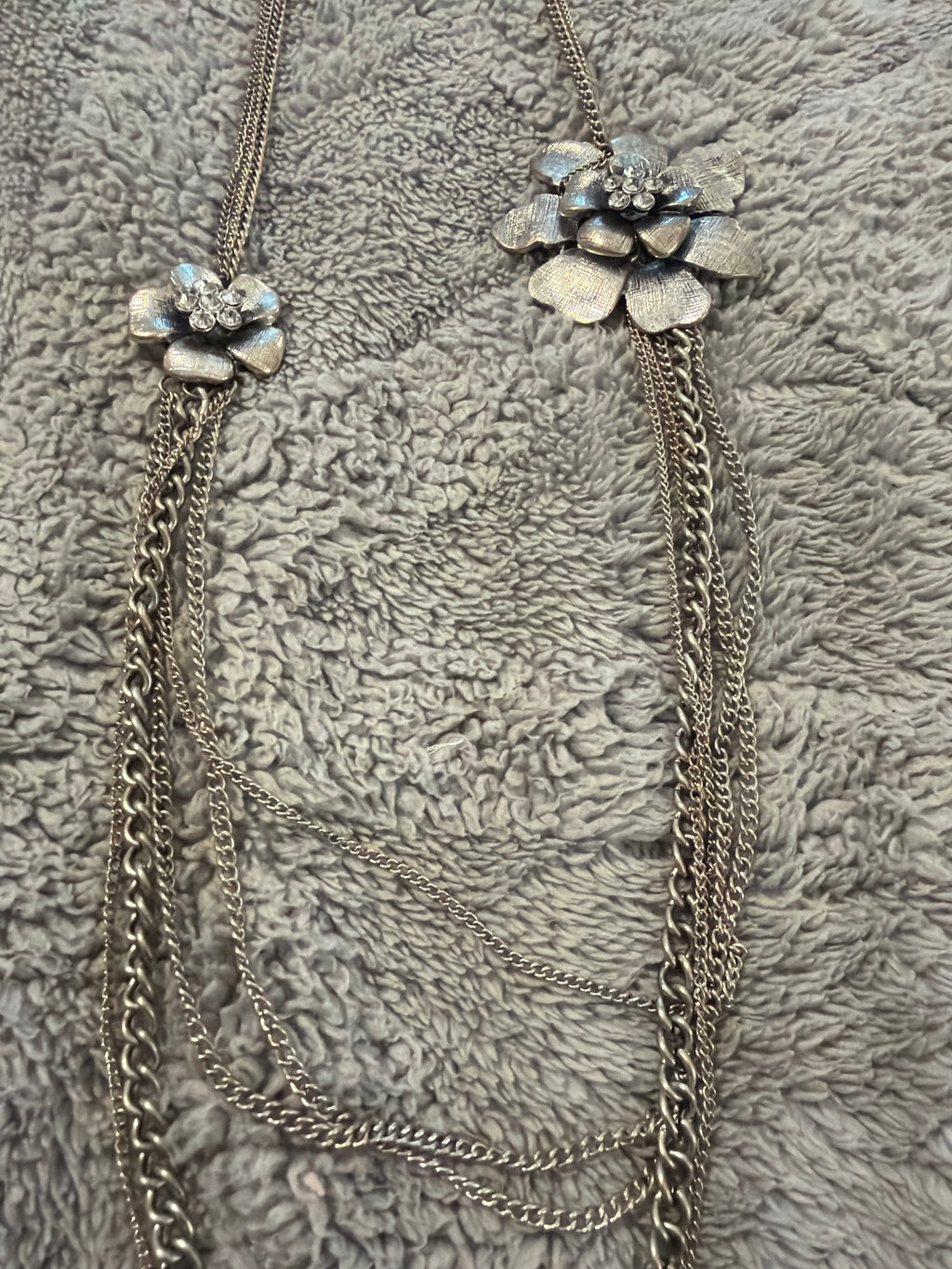 Silver Necklace with flower accents, 18” long. *some wear