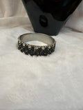 Black and rhinestone metal bracelet, $7.00